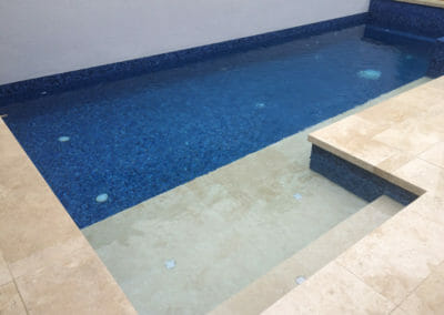 Drop face ivory travertine pool coping